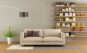 Contemporary living room with sofa and minimalist bookcase - 3D Rendering